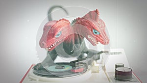 Toy dinosaur spinning discs on record player