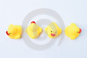 Toy ducks heading with different directions. Business innovation, unique and think different concept