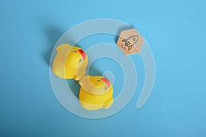 Toy ducks heading to the rocket symbol. Start up and business target achievement concept