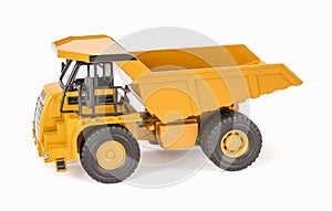 Toy dump truck with open-box bed. Children`s toy plastic haul truck car with isolated on white background