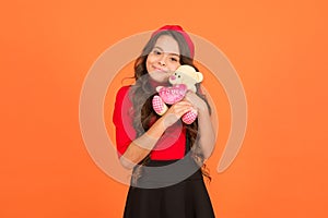 Toy friend let me play with you. Happy child cuddle teddy bear. Little girl smile with toy friend. Friend and friendship