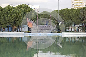 Toy galleon in an artificial lake