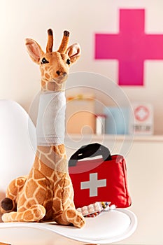 Toy giraffe with bandaged neck