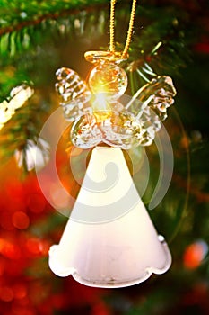 Toy glass angel decoration on the Christmas tree