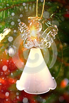 Toy glass angel decoration on the Christmas tree
