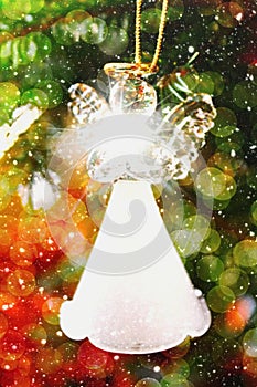 Toy glass angel decoration on the Christmas tree