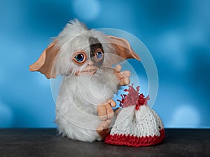 toy Gremlin Gizmo, hand made in a mixed technique from faux fur and polymer clay