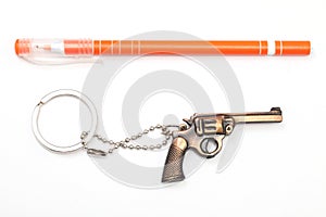 Toy gun with key chain and pen