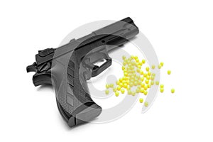 Toy gun with pellets isolated