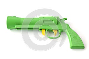 A toy gun on a white background