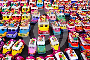 Toy handmade cars on the market stall, Chichicastenango, Guatemala photo