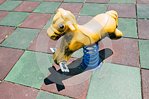 Toy horse in childrens playground