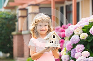 Toy house, family home. Real estate housing, home care, family day care concept.