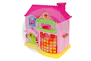 A toy house. Pink dollhouse on white background, isolated