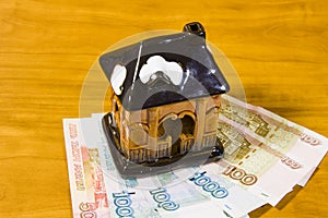 A toy house and Russian money