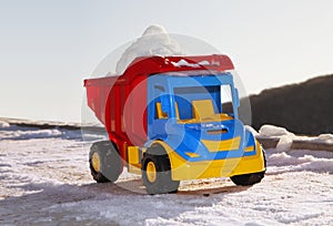 Toy like snow removal machine