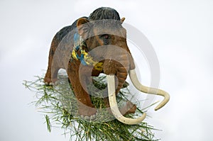 Toy mammoth on the grass