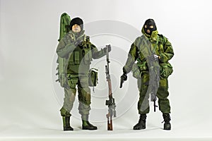 Toy man soldier action figure miniature realistic silk white background