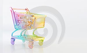 Toy metallic pastel shopping cart on grey background, 3d style illustration