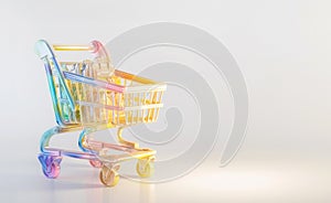 Toy metallic pastel shopping cart on grey background, 3d style illustration