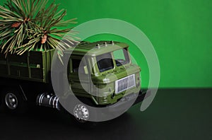 Toy military car for February 23 Men`s Holiday