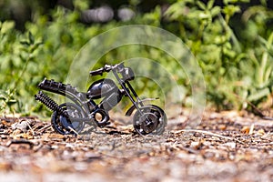 Toy model of a sports motorcycle on a blue background