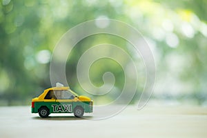 Toy model of Thai personal Taxi-Meter cab