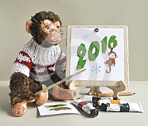 Toy monkey - painter