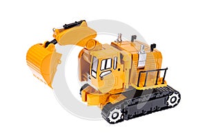 Toy orange excavator with a bucket. On a white background, isolated