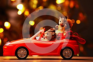 Toy red car squirrel family