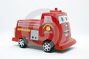 Toy red fire truck isolated on white background