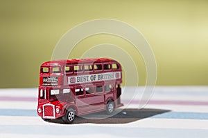 Toy that represents the classic London red double-decker bus