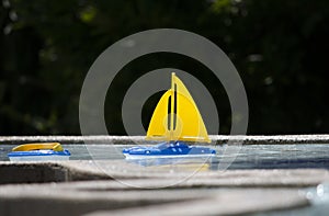 Toy sailboat in water