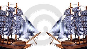 Toy sailing boat on white background