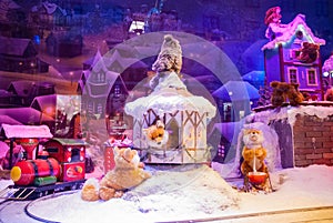 Toy shop display window winter Christmas model train animals