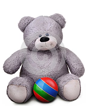 Toy soft teddy bear with striped ball