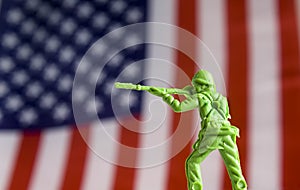 Toy Soldier in front of flag