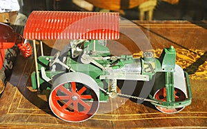 Toy steamroller at a stand of Los Encantes Nuevas or Fira de Bellcaire, Barcelona photo