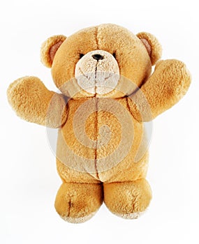 Toy teddy bear on a white background