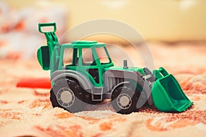 A toy tractor in the nursery