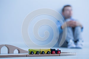 Toy train and little boy