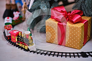 A Toy Train Set on the railroad under the Christmas tree