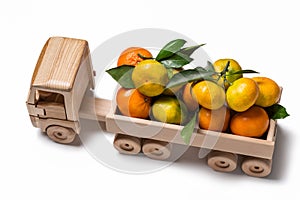 Toy truck with clementines and tangerines for Christmas.