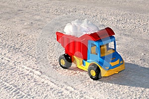 Toy truck removes snow