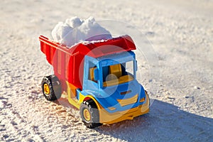 Toy truck removes snow on highway