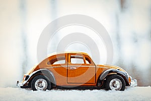 Toy Volkswagen Beetle in Snow