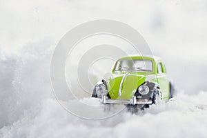 Toy Volkswagen Beetle in Snow