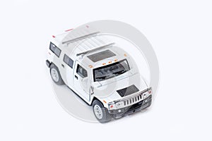 Toy white jeep isolated