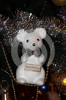 Toy white rat on the Stoker of gold beads