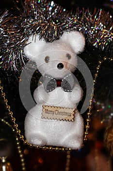 Toy white rat on the Stoker of gold beads